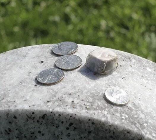 Meaning Behind the Tradition of Coins on Gravestones